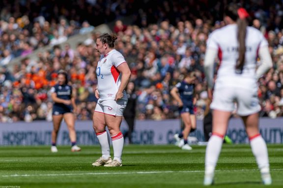 Open play action from the Women's Six Nations rugby match between Scotland and England in Edinburgh.
