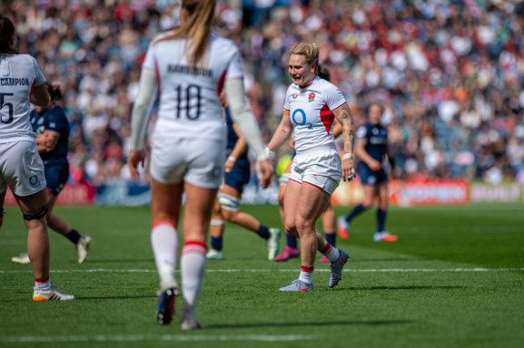 Open play action from the Women's Six Nations rugby match between Scotland and England in Edinburgh.